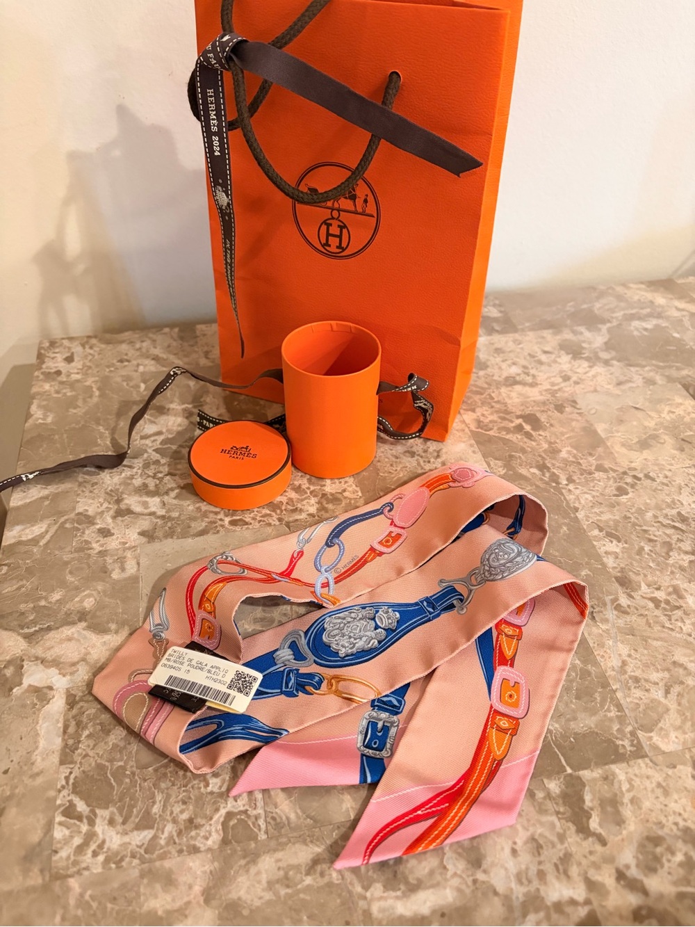 Brand New with Tag! Hermès Pink Silk Twilly with Blue and Red Equestrian Print